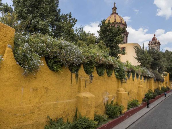 Mexico Yellow wall outside church